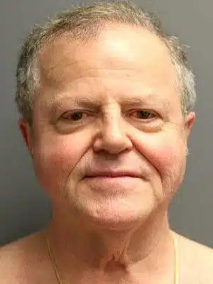 A close-up view of an older man's face before facelift surgery