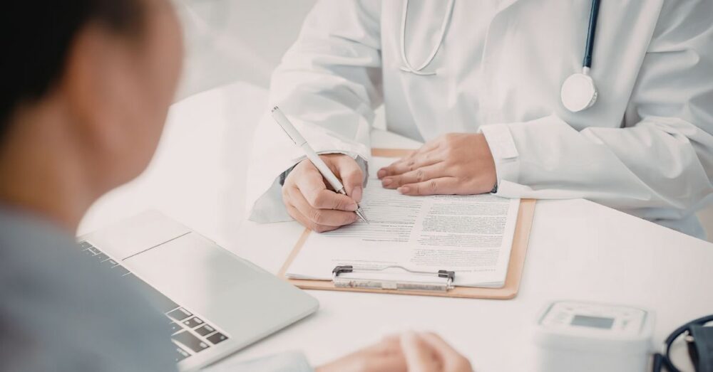A professional photo of doctor consulting with a patient A professional photo of doctor consulting with a patient